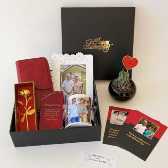 Elegant  Anniversary gift hamper with a Frame , Mug and blissful greetings