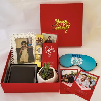 Premium Birthday gift hamper with frame, wallet and a sweet greetings.