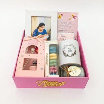 Elegant Birthday gift hamper with frame, macrons and a sweet greetings.