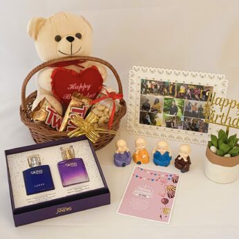 Premium Birthday gift hamper with Perfume, Teddy Bear and a sweet greetings.