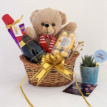 Pleasant gifts for your close her. Gift wine and teddy bear and minimal plant.