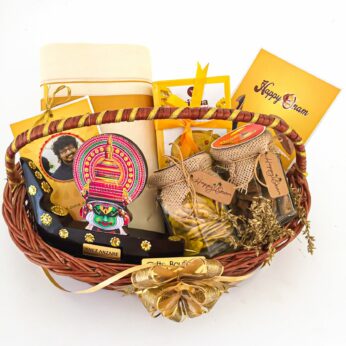 Elegant Kerala style onam hamper for men with Kerala mundu and kathakali boat