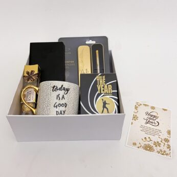 Delightful new year gift hamper with a perfume , Parker pen and adorable greeting cards