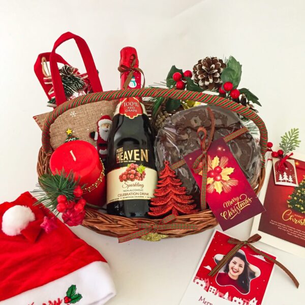 Exciting happy holidays gift basket with sparkling grape juice, rich plum cake, chocolate bag and may items - Image 2