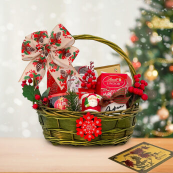 Ancient vintage christmas gift hampers includes many chocolates in a green basket