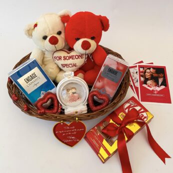 Dazzling Valentine’s Day gift hamper with chocolates, perfume, a couple glass dome, and more