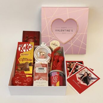 Alluring valentine’s day gift hampers with elegant Couple Dome, Candy, Perfume And Cards