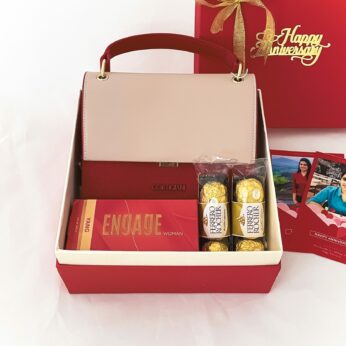 Charming Anniversary Gift Hamper With Sling Bag, Perfume Cards  and Blissful Greetings.