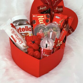 Ideal valentine day special gift Hampers With Elegant Teddy, Chocolates, Nutella, Photo Frames, And Cards