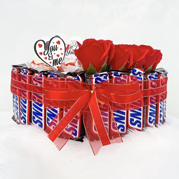 Enchanting love gift for wife adorned with artificial flowers and chocolates - Image 3