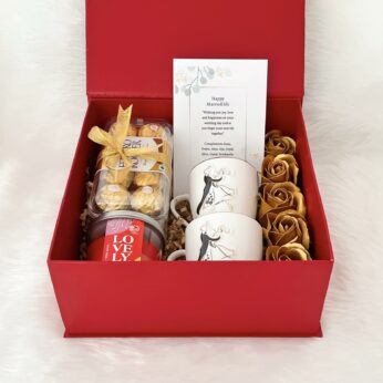 Delightful Wedding gift box for couples with, artificial flowers, greeting cards & more