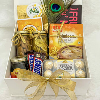 Yummy gourmet gift hamper for vishu filled with palada mix, banana chips, and chocolates