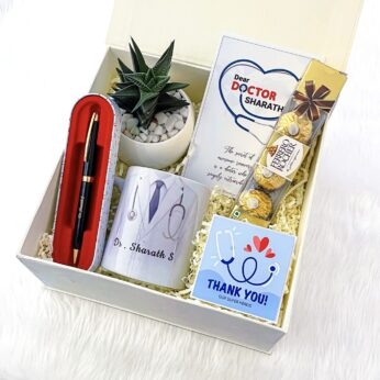 Delight thank you doctor gift hamper includes Personalised mug, Pot, Pen and more.