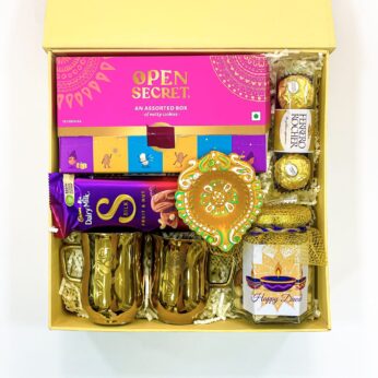 Dame Fortune Diwali gift hamper With Assorted Cookies, Chocolates, Mugs, And Diya