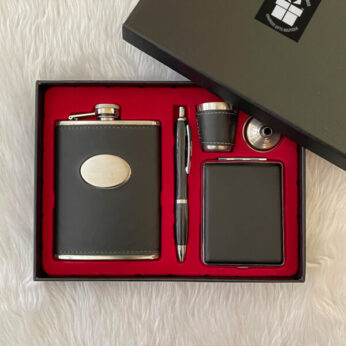 A one-of-a-kind hot gift box for him filled with a hip flask set and a pen