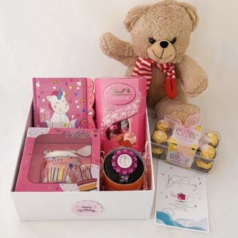 Charming gift hamper for little girl on her birthday, with teddy, chocolates, and more