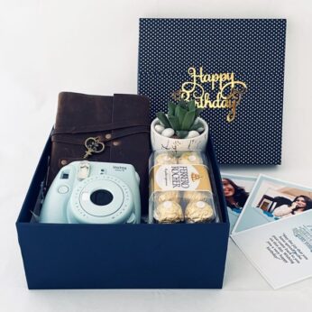 Premium Birthday Hamper for sister adorned with Camera, chocolates, dairy, and more