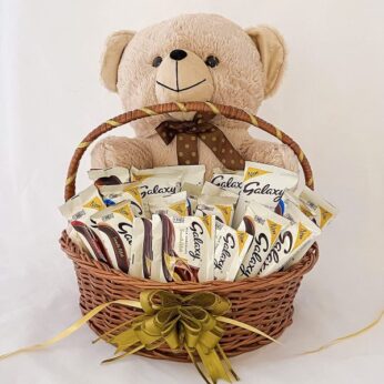 Appealing birthday gift for girlfriend in India adorned with a teddy & chocolates