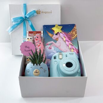 The White Unicorn Birthday Gift For Baby Girl With Chocolates, Marshmallows, Polaroid Camera, And More