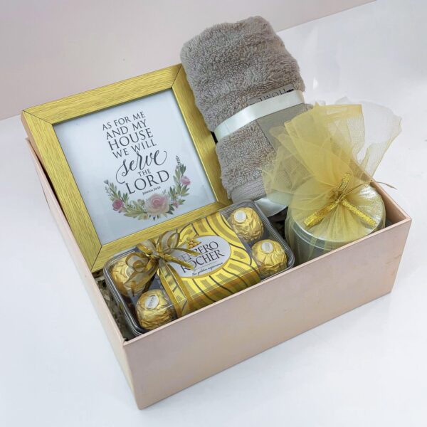 Golden Ecstasy Housewarming Gift With Chocolates, Face Towel, Scented Candle, And Photo Frame - Image 4