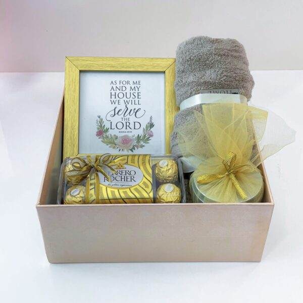 Golden Ecstasy Housewarming Gift With Chocolates, Face Towel, Scented Candle, And Photo Frame - Image 5