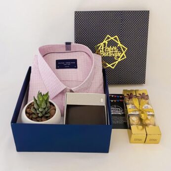 Stylish 1st anniversary gifts for him contains a shirt, wallet, and chocolates