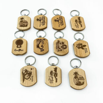 Wooden Kerala keychains ( 12 types ) with a height of 4cm, a width of 5cm, and a length of 1cm