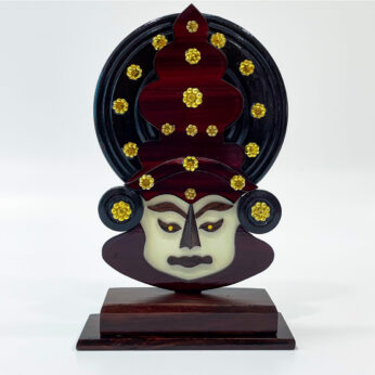 Handcrafted wooden Kathakali head stand: H 9.25 x W 5.75 x L 2.5 inches