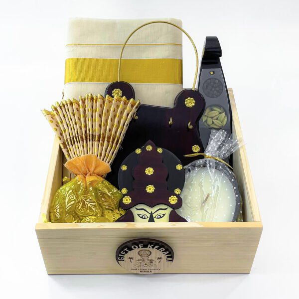 Exquisite Onam gift box embellished with a Kerala mundu, Udayada, and Kathakali head. - Image 2