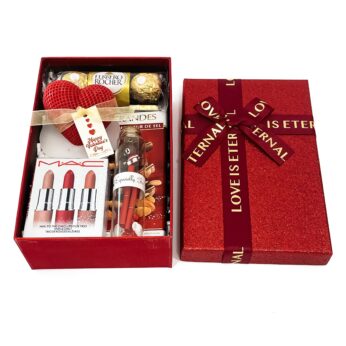 Luxury Valentine’s Day presents decorated with Valentine’s Heart candles, chocolates, and more