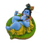 Bal Krishna on petal leaf