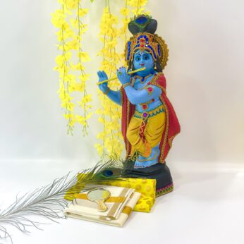 Vishu Festival Ensemble: Krishna Idol(H-21.5inc, L-8.2inc, w -6inc), Peacock Feather(H-6.5inc, L-12inc), and More