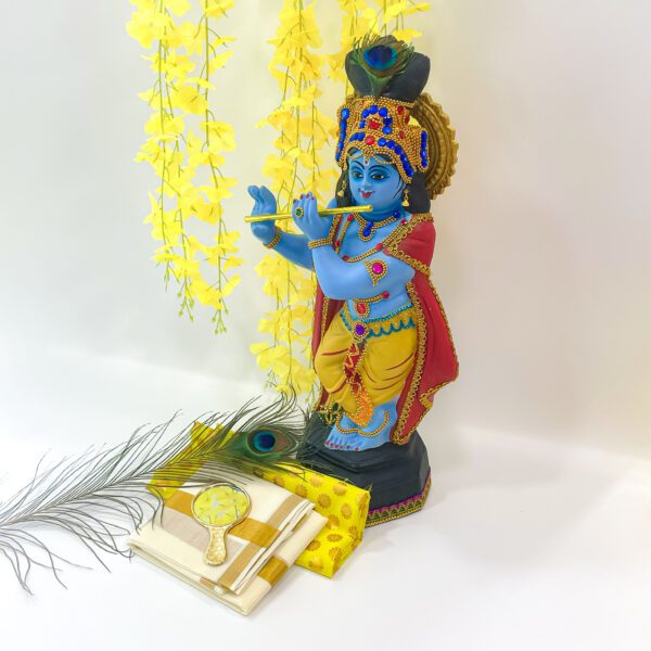 Vishu Festival Ensemble: Krishna Idol(H-21.5inc, L-8.2inc, w -6inc), Peacock Feather(H-6.5inc, L-12inc), and More - Image 2