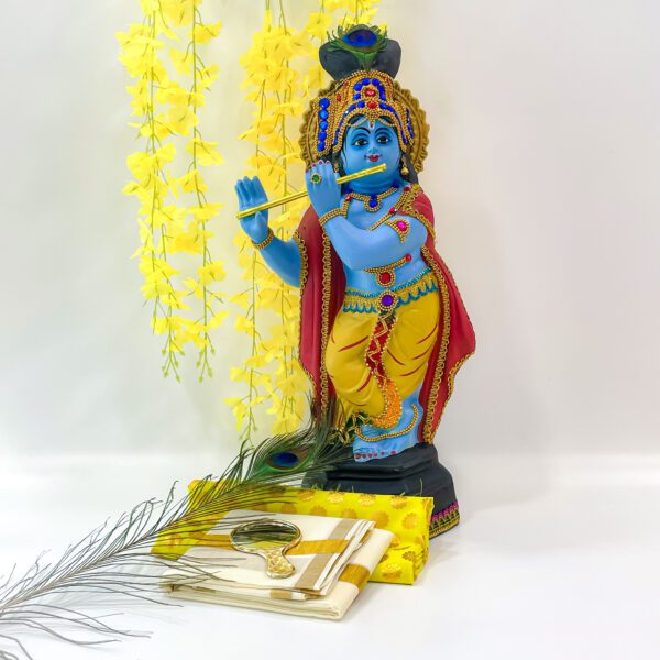 Vishu Festival Ensemble: Krishna Idol(H-21.5inc, L-8.2inc, w -6inc), Peacock Feather(H-6.5inc, L-12inc), and More - Image 3